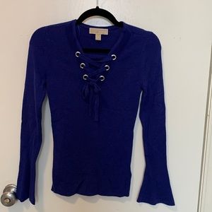 Top with bell style long sleeves